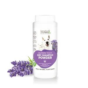front of bottle with lavender leaves next to it