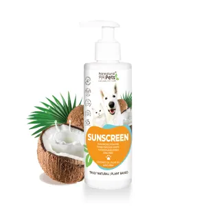 front of bottle with coconut next to it