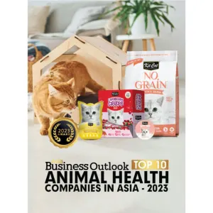 cat with various kit cat products being awarded the animal health award 2023
