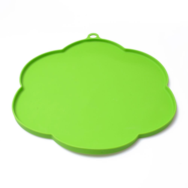 Bright green silicone flower shaped placemat for cat bowl