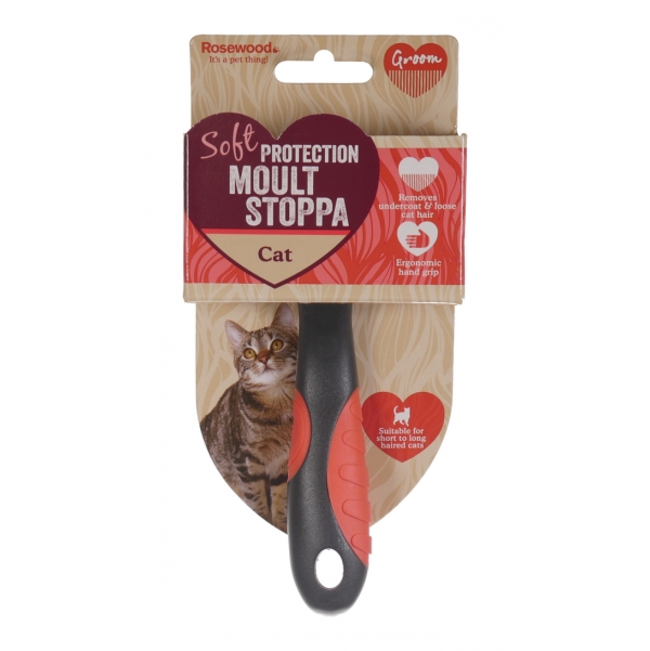 Purple handled deshedding brush tool for cats