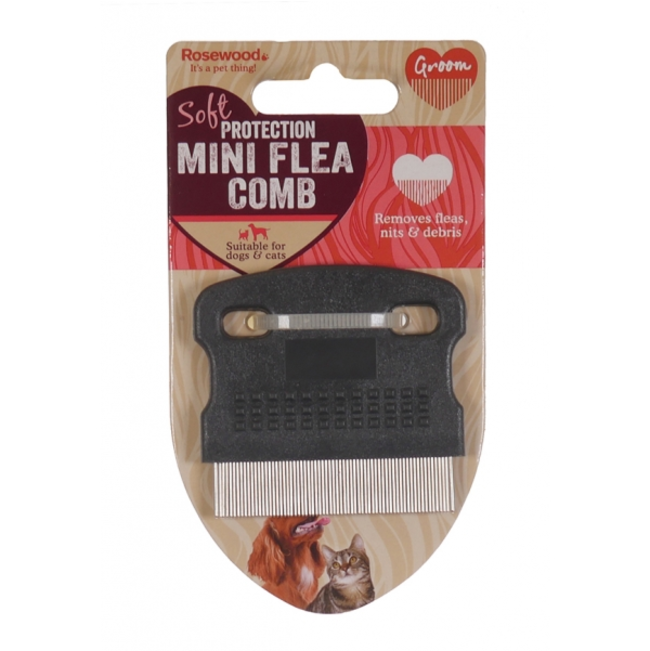 Purple handled flea comb for dogs and cats