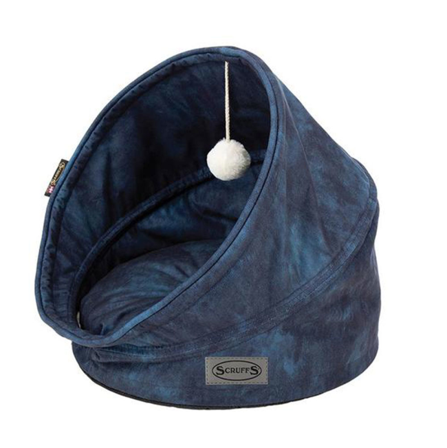 A side view of the luxurious Kensington cat bed by Scruffs in a navy colour with a white rattling toy attached