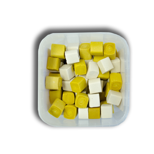 Probono Juicy Jaggers Dog Chews top view yellow and white cube treats