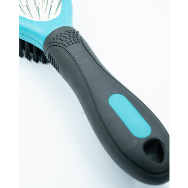 Double Sided Pin Brush For Dogs close up of black handle with blue accents