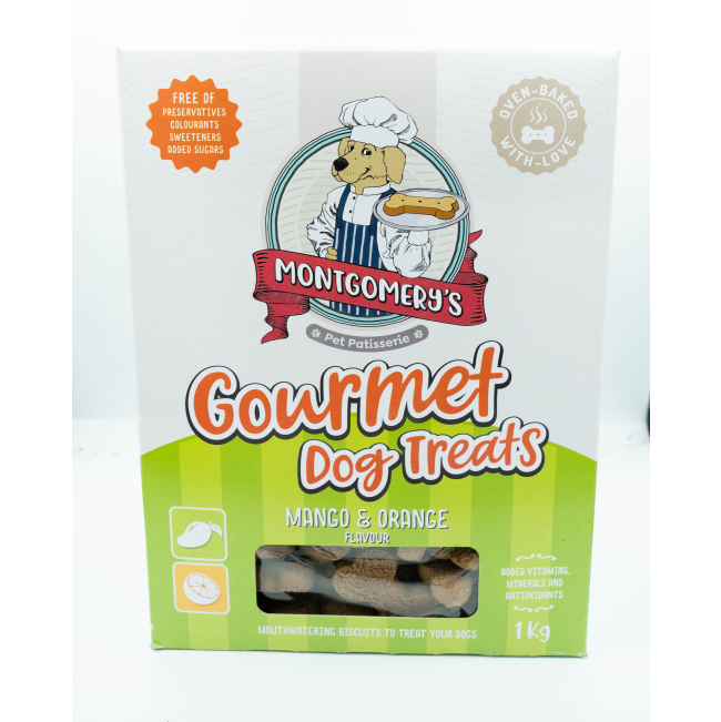 Montgomery’s Mango and Orange Dog Biscuits in carton box with lime green colors