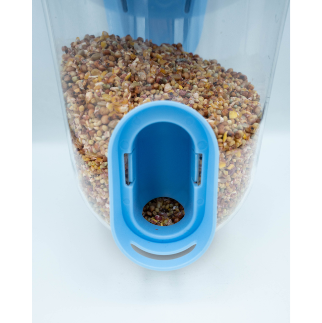 Singing Friend Seed Feeder For Birds blue color with seeds, close up of opening