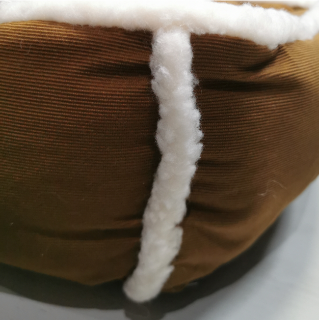 Marltons Box Sheepskin Pet Bed outer corner with white sheepskin and brown material