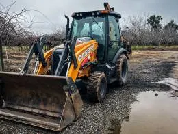 Case 580 SN  2