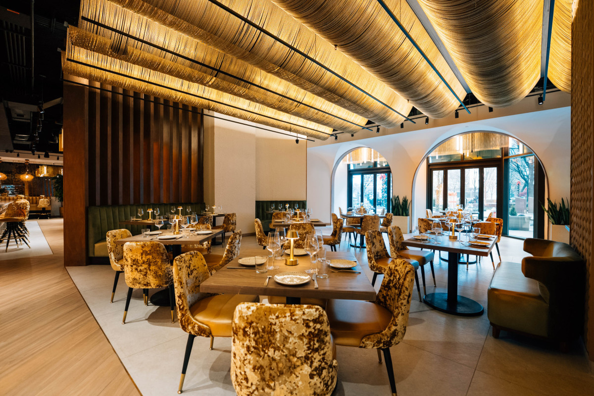 Photo 1 of 4: Solaz Mediterranean Cuisine + Full Swing Golf Suites