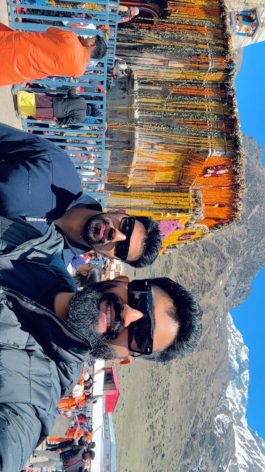 Friends exploring a colorful hillside market