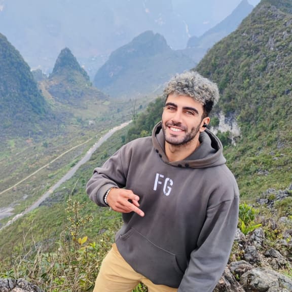 Me on top of a mountain in Ha Giang (Vietnam)