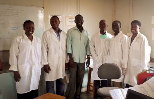 Group photo in a science lab.