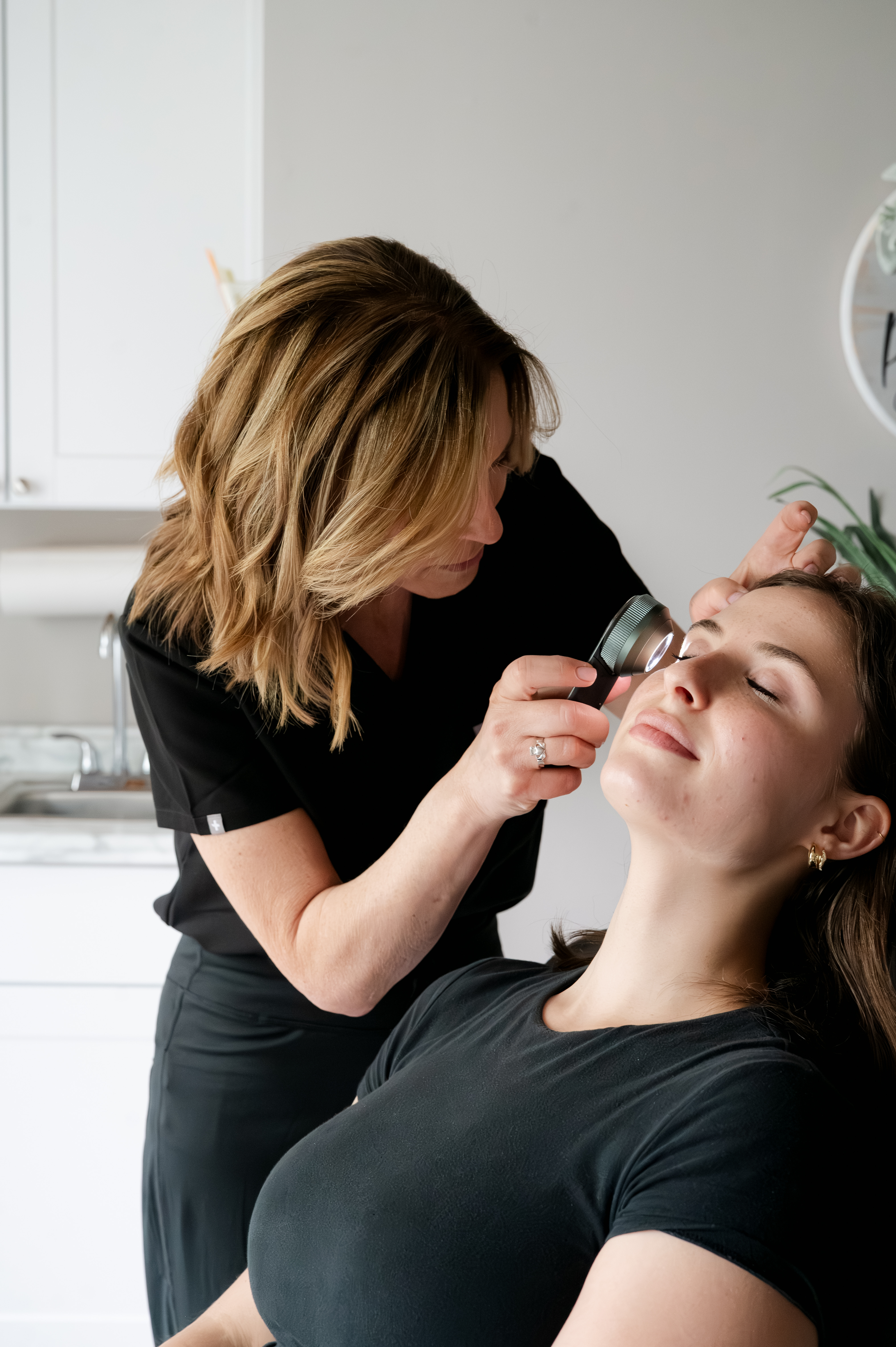 Clinical skin evaluation at Lenore Skincare and Wellness