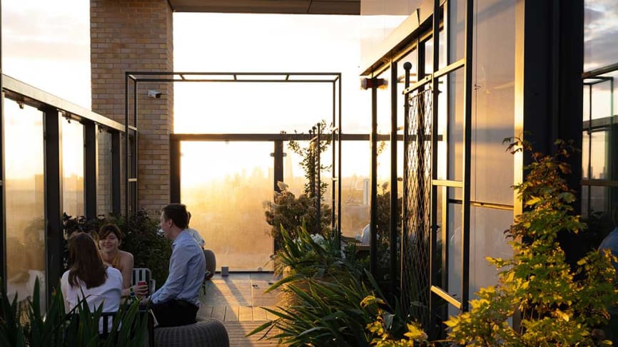 A modern apartment building in the UK features large windows and balconies that provide stunning views of the city skyline, representing a desirable option for private tenants seeking rental properties in the private rented sector. This contemporary design reflects the evolving landscape of urban living, amidst discussions around renters rights and tenancy agreements.