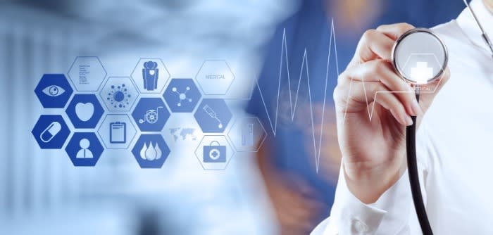 A healthcare professional holding a stethoscope with digital medical icons in the background, symbolizing modern healthcare technology and diagnostics.