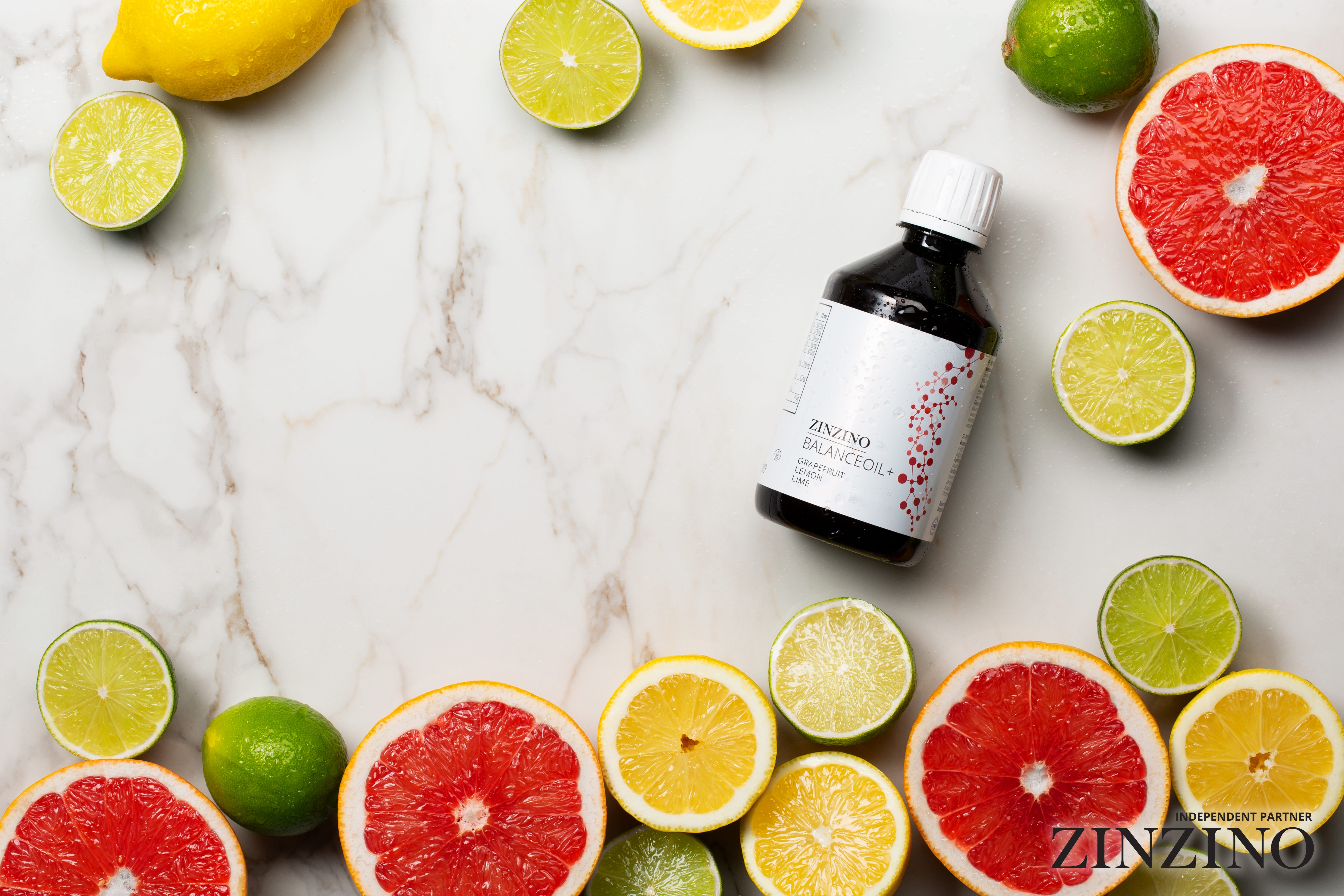 zinzino-ip-images-product-content-balanceoil-plus-grapefruit-lemon-lime-surrounding-fruit