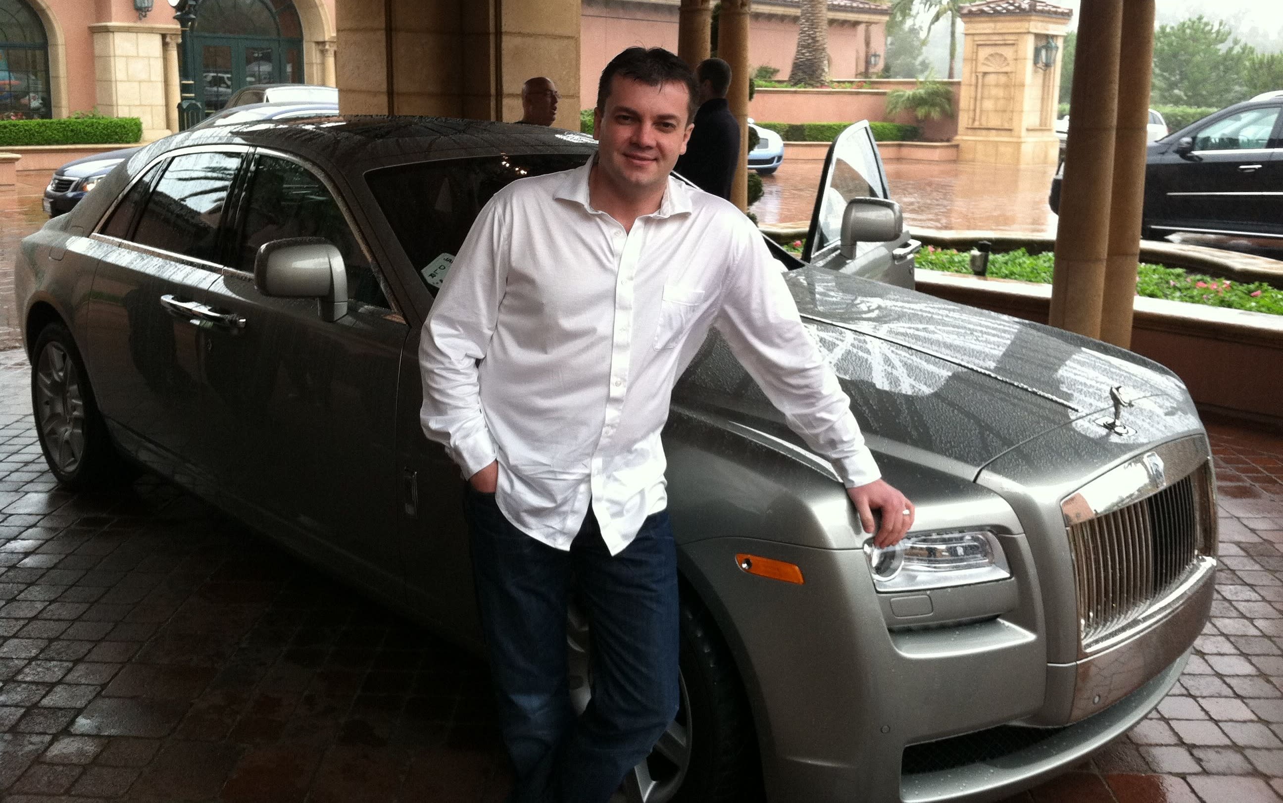 vick infront of his rolls royce