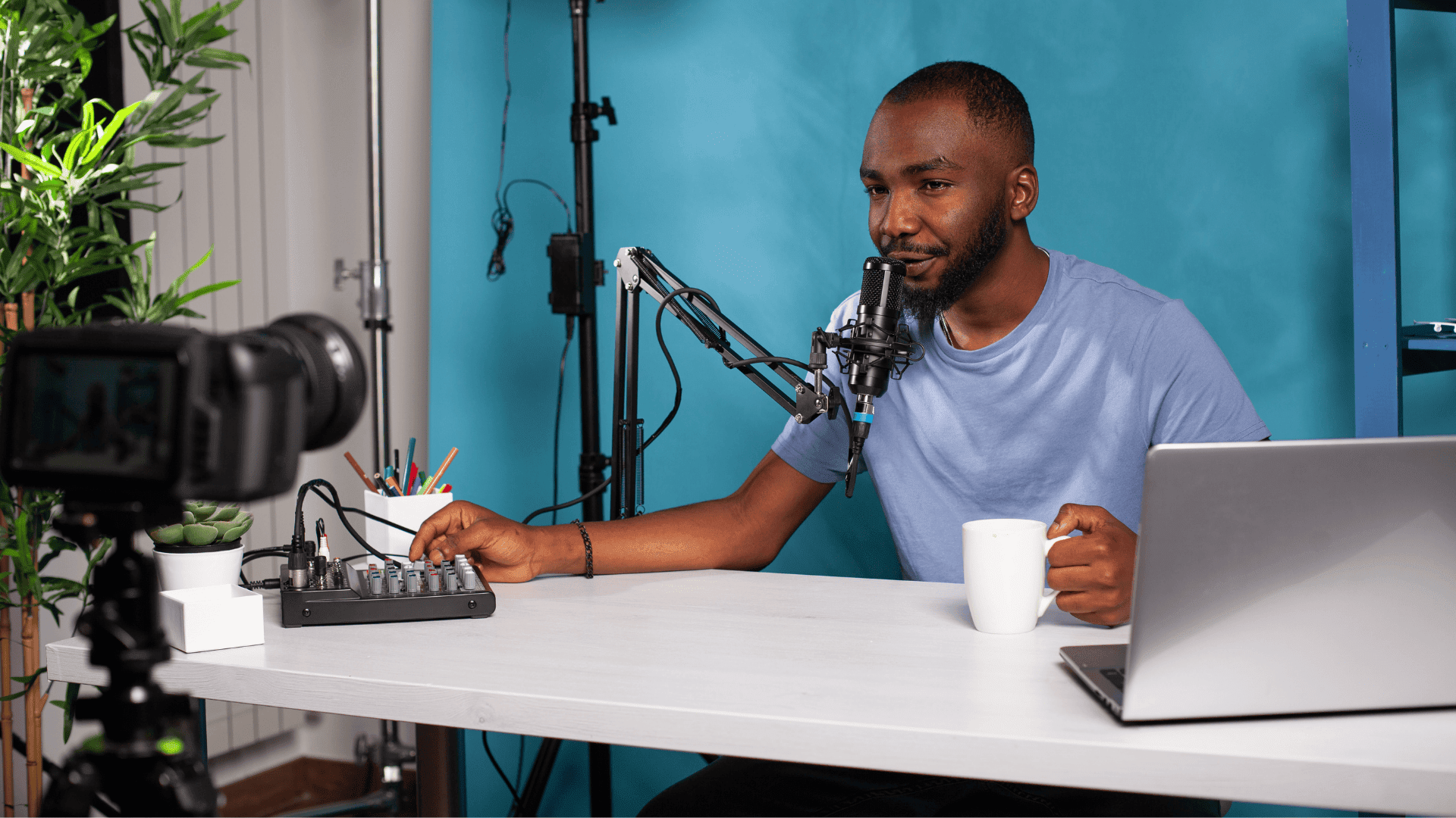 man recording youtube video