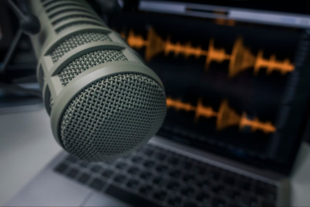 Podcaster Microphone and Computer