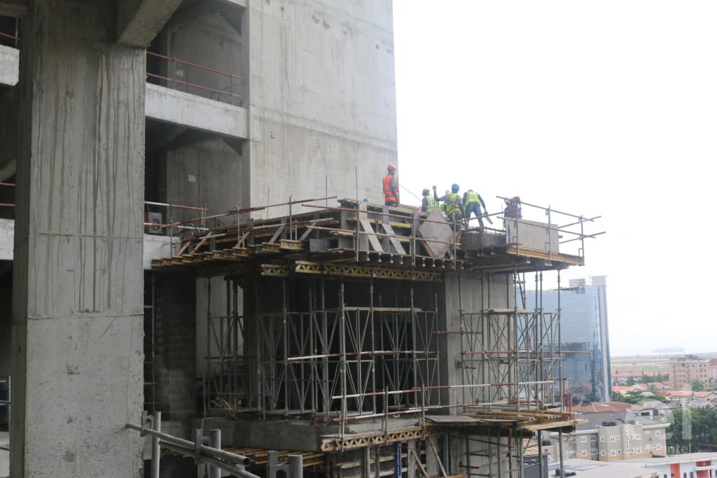 Picture of 4 construction workers working on Trinity Towers