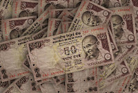 USD/INR gains ground following RBI rate decision, eyes on US NFP data