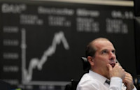 Markets on hold ahead of Fed, but UK data stirs rate pause talk