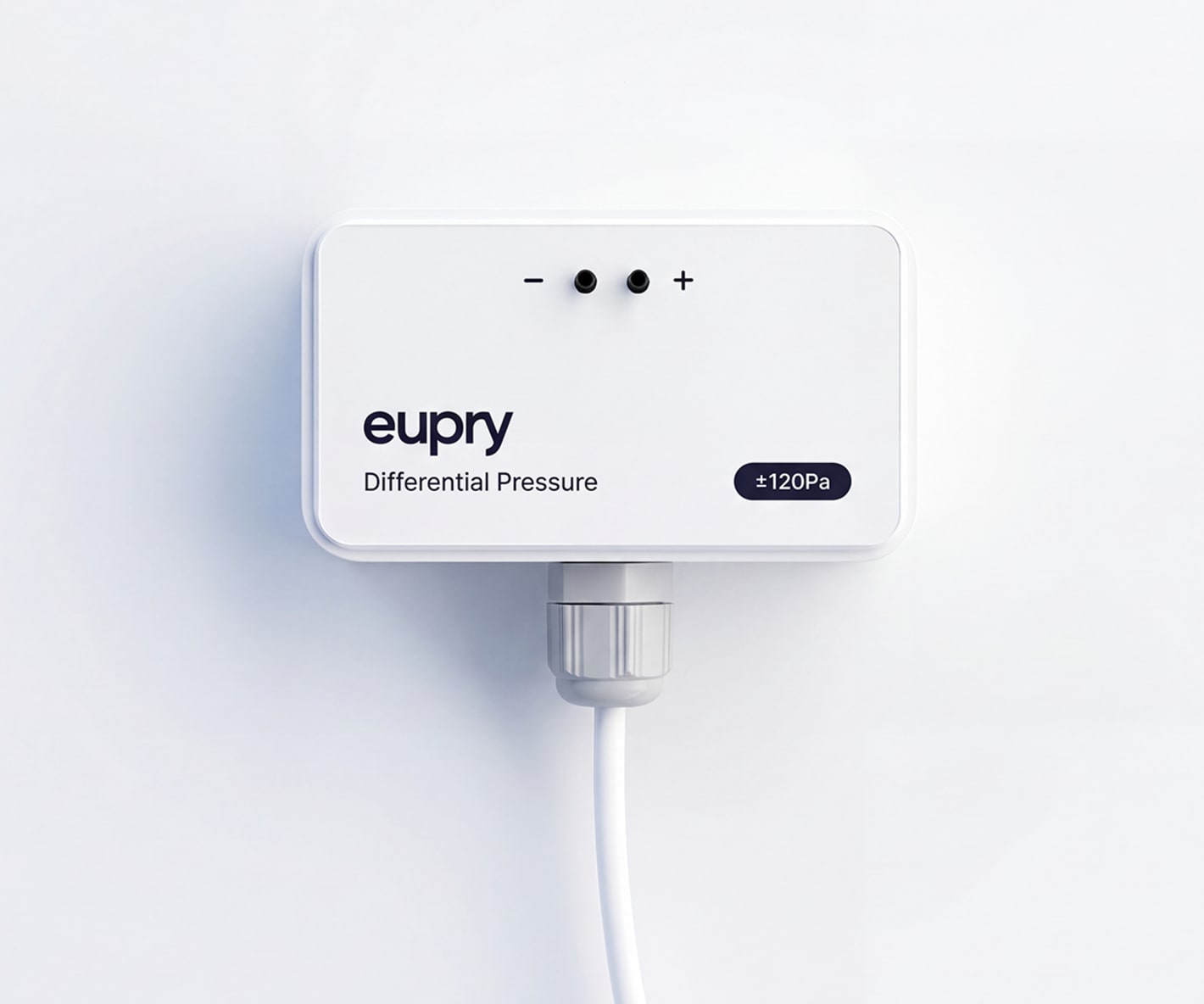 Eupry differential pressure sensor ±120Pa with dual ports and cable connector, mounted on white wall