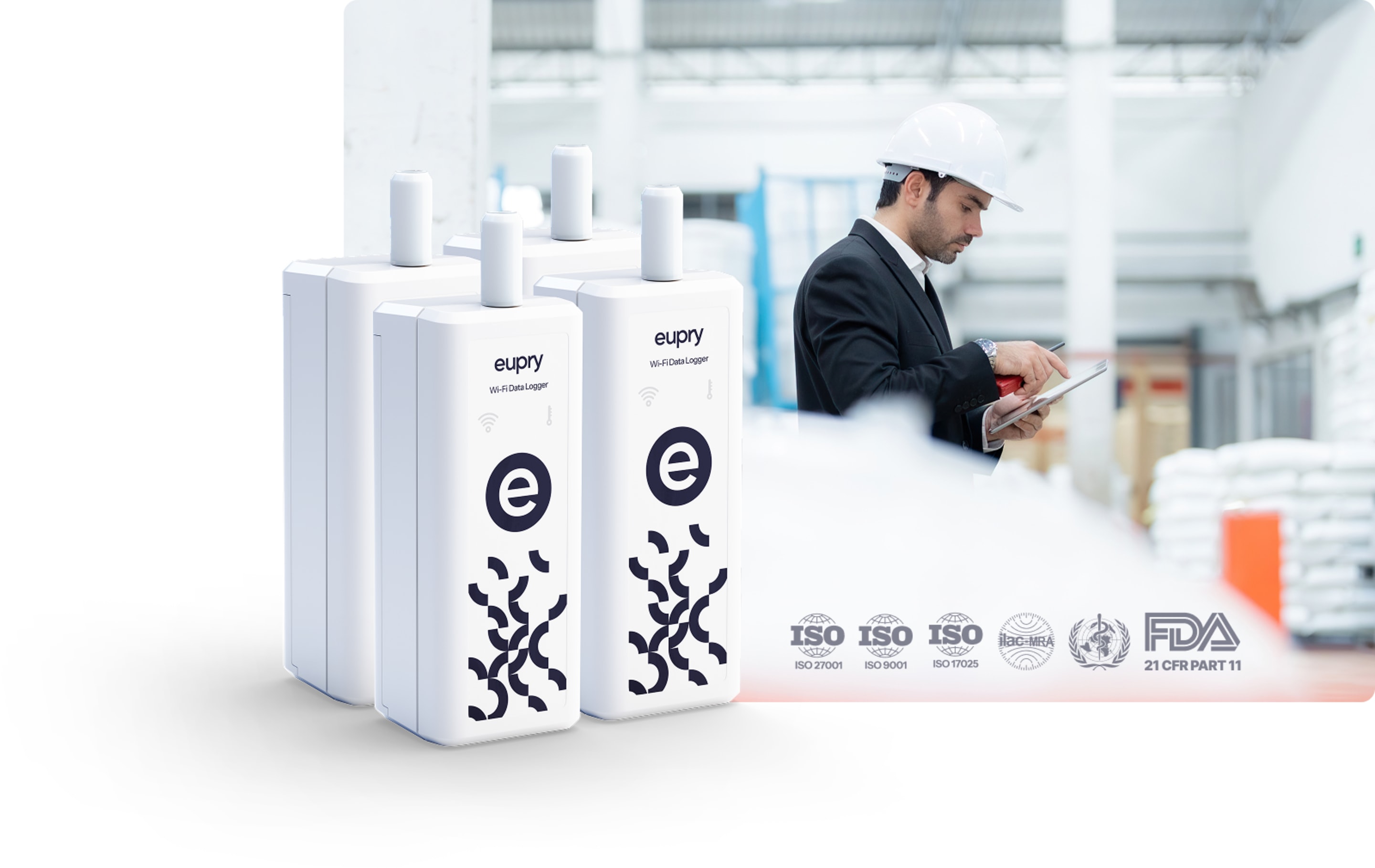 Eupry Wi-Fi data loggers displayed in a warehouse with a professional in a hard hat reviewing a tablet, showing ISO and FDA certifications.