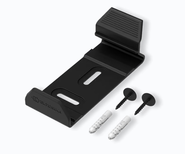 Teltonika black wall mounting bracket with two screws and two white wall anchors