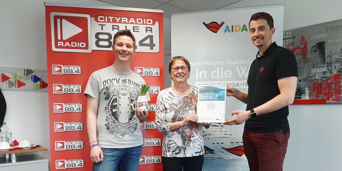 Gregor bei Gutscheinübergabe im Rahmen des Gewinnspiels mit dem CityRadio Trier