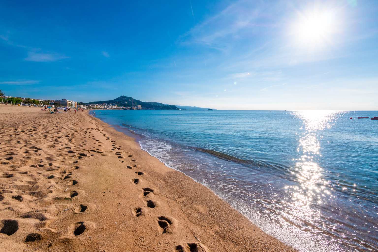 Blanes beach, wide sand and shimmering sea