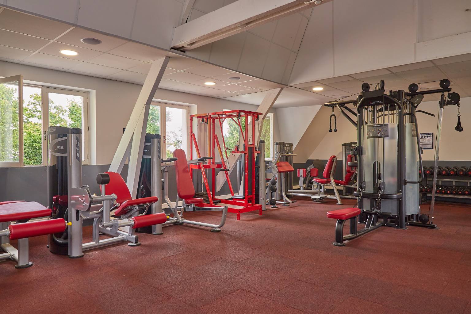 Weights and bench gym equipment inside at Port de Plaisance campsite, Benodet, France