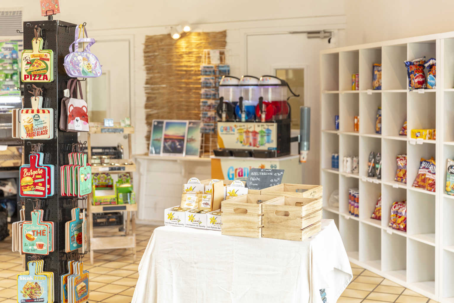 Groceries and gifts within the mini store at Les Chardons Bleus de la Turballe campsite, Brittany
