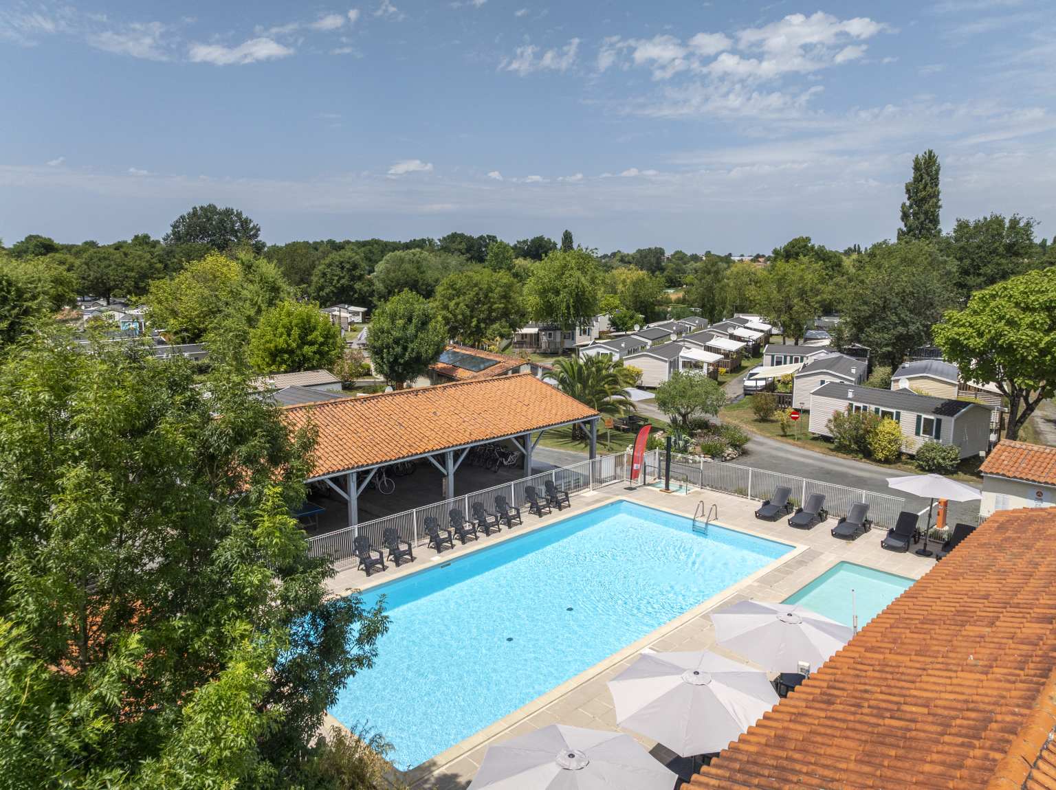 Aerial view of the rectangular pool at Les Catalpas de Royan campsite, Saint Georges de Didonne, France 