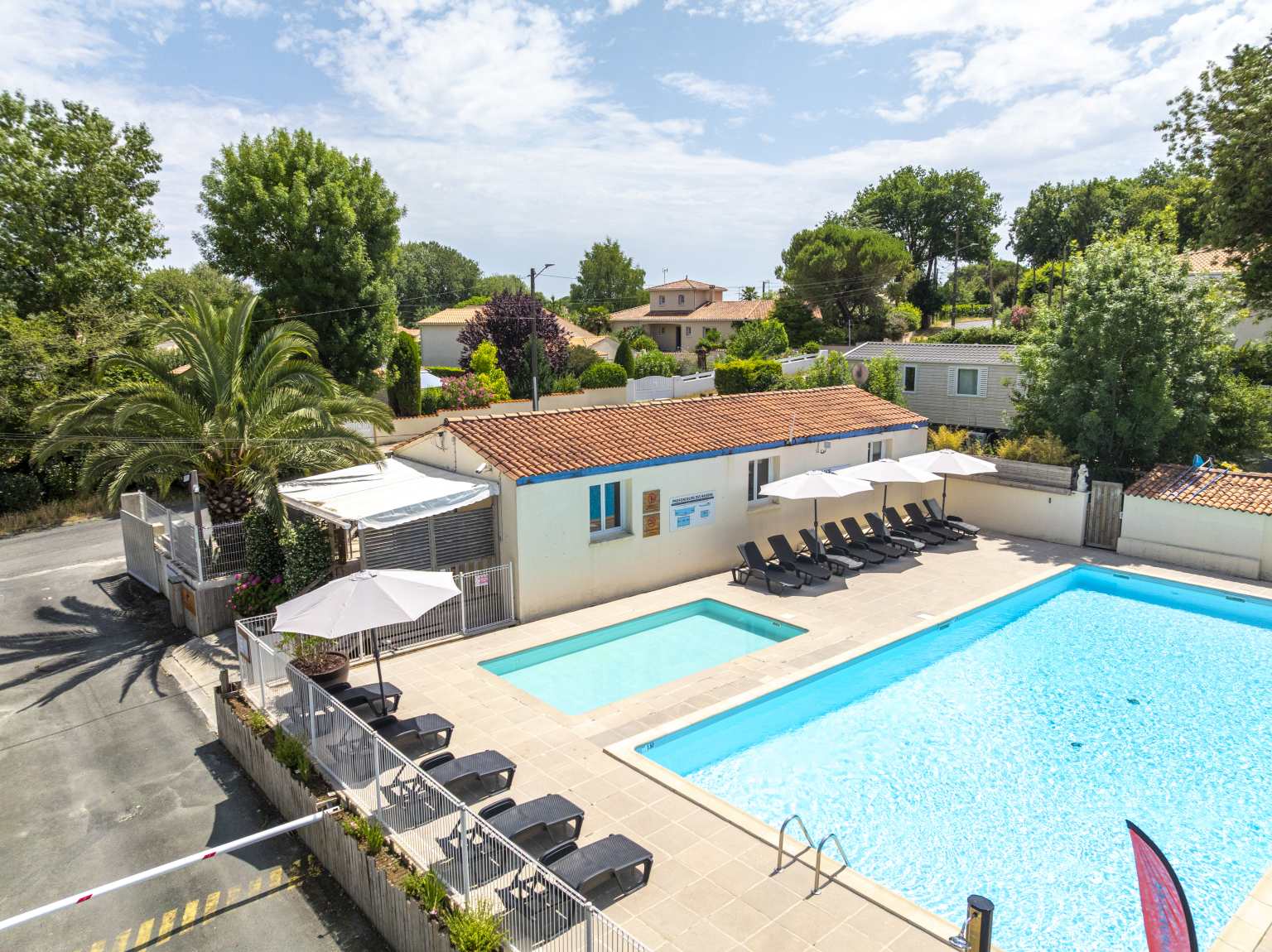 Rectangular pool and toddler pool at Les Catalpas de Royan campsite, Saint Georges de Didonne, France