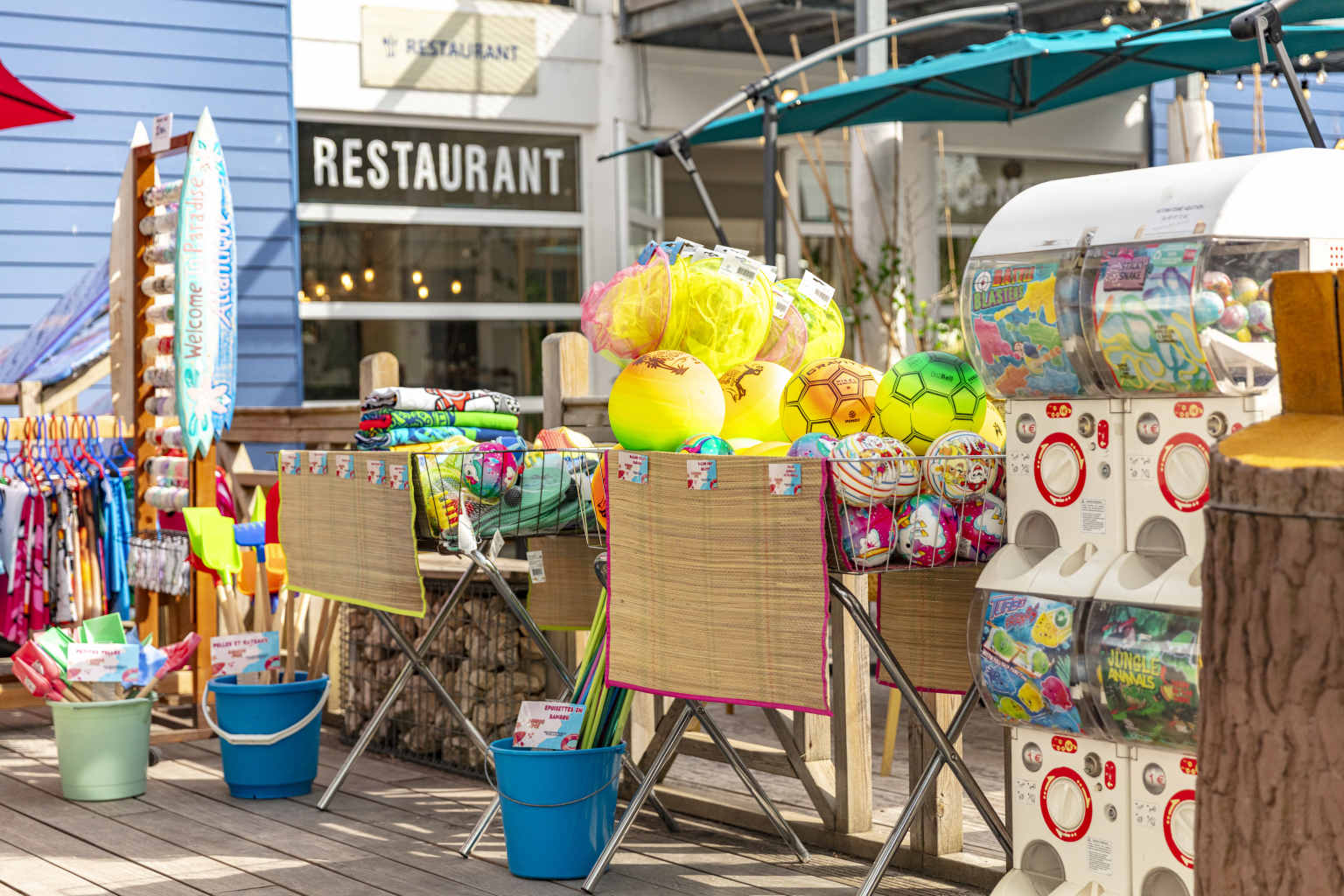 Pointe du Medoc, Gironde, on site shop inflatables, spades and other toys on display