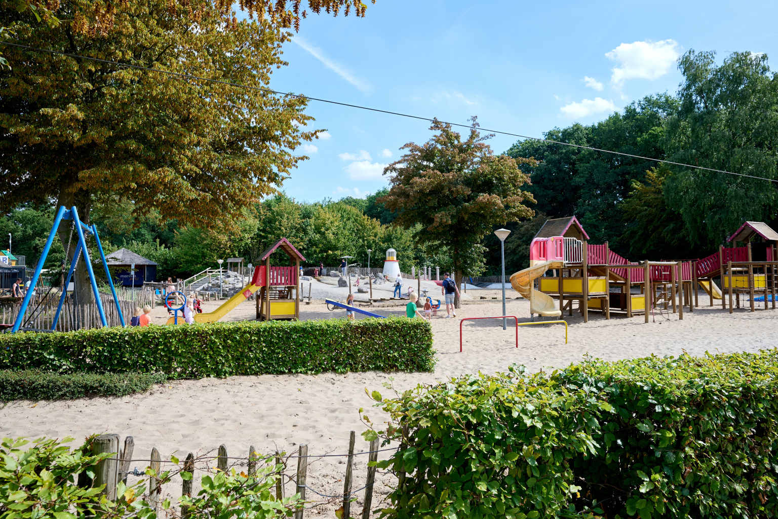 Small play equipment for younger children, swings, slides and climbing frames at the end of the play area at Marvilla Parks Kaastsheuvel, North Brabant, Netherlands