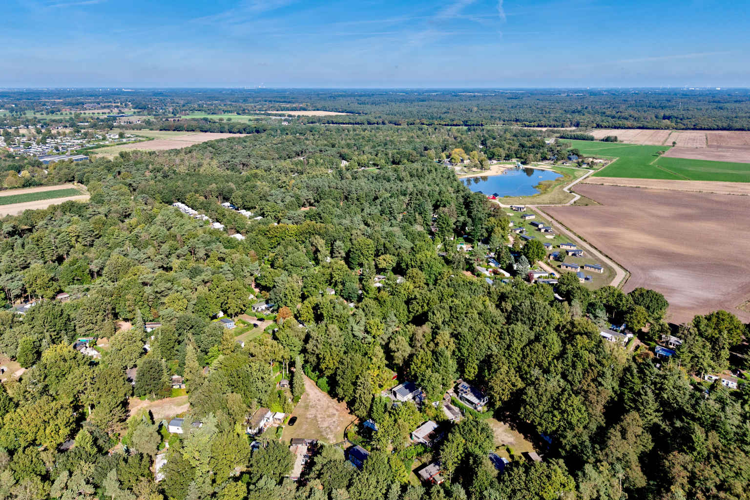 Aerial view of the woodland where holiday homes are pitched at De Flaasbloem campsite in the Netherlands