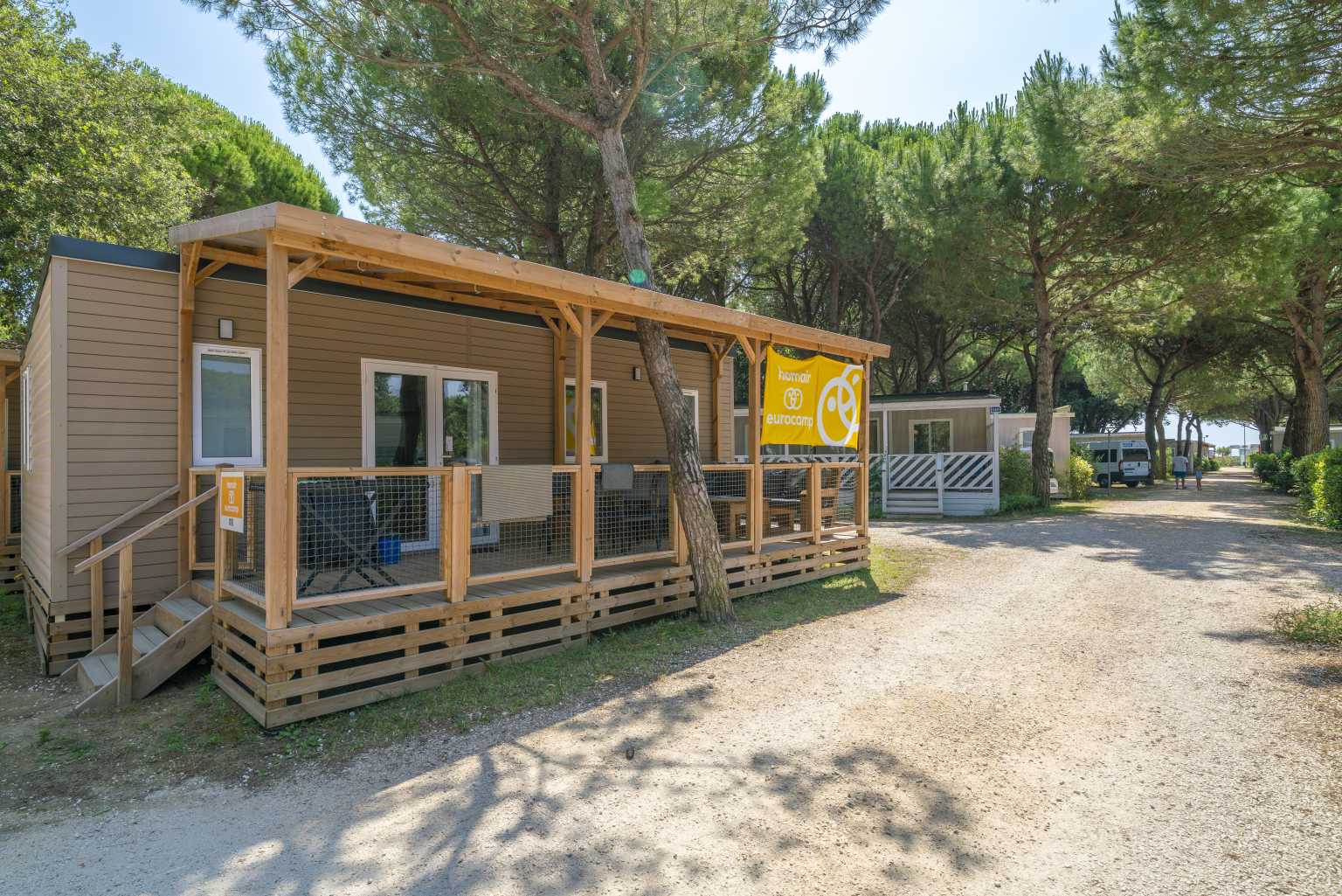 Holiday home accommodation with covered decking at Jesolo Mare Camping Village, Adriatic