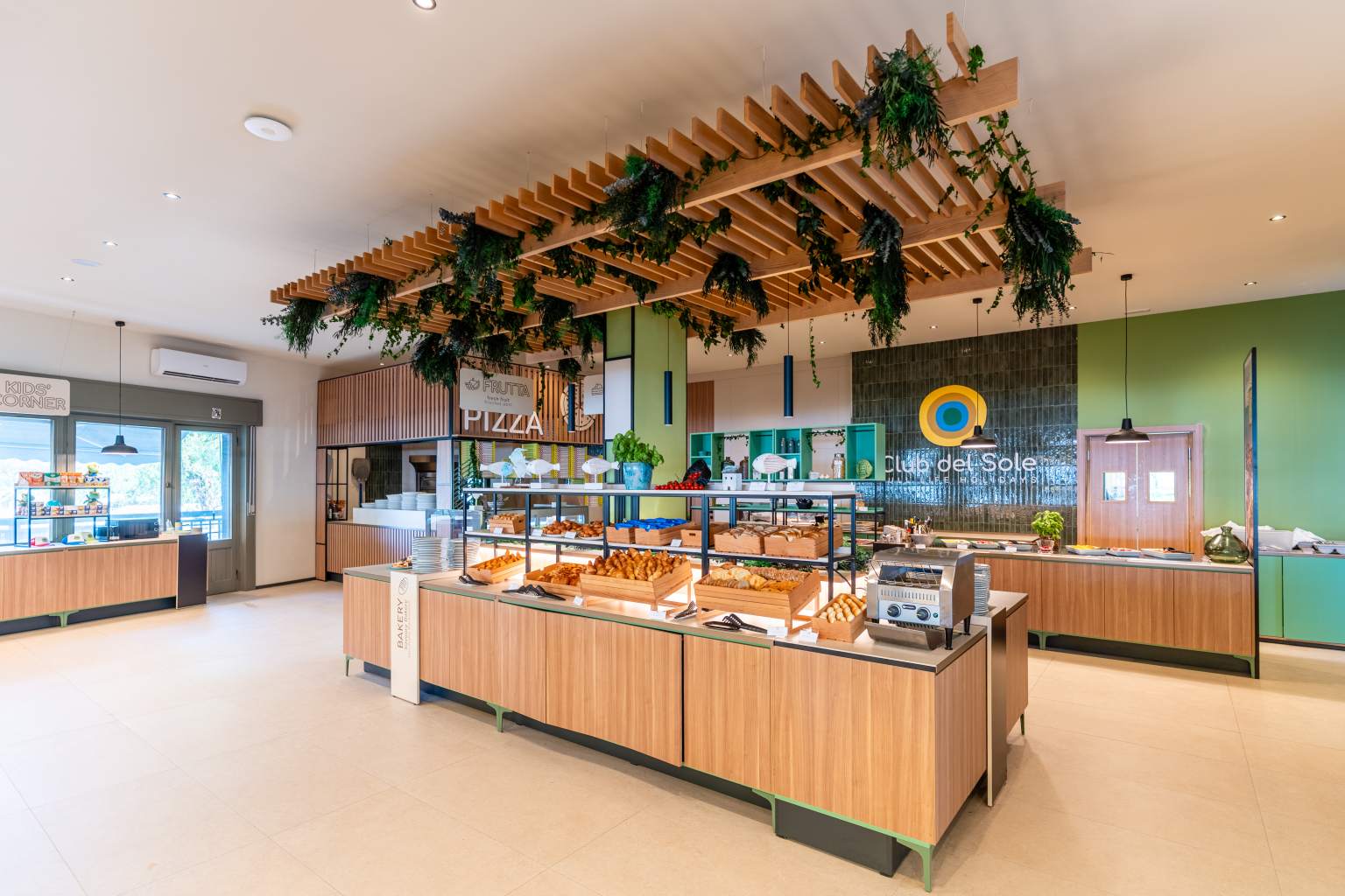 Modern pizzeria and bakery counters at Tenuta Primero Grado