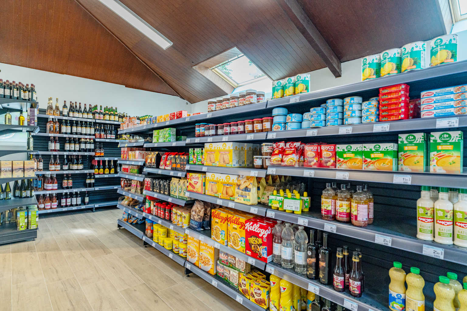Tinned groceries on the shelves of the onsite shop at Lac des Vielles Forges campsite in the Ardennes