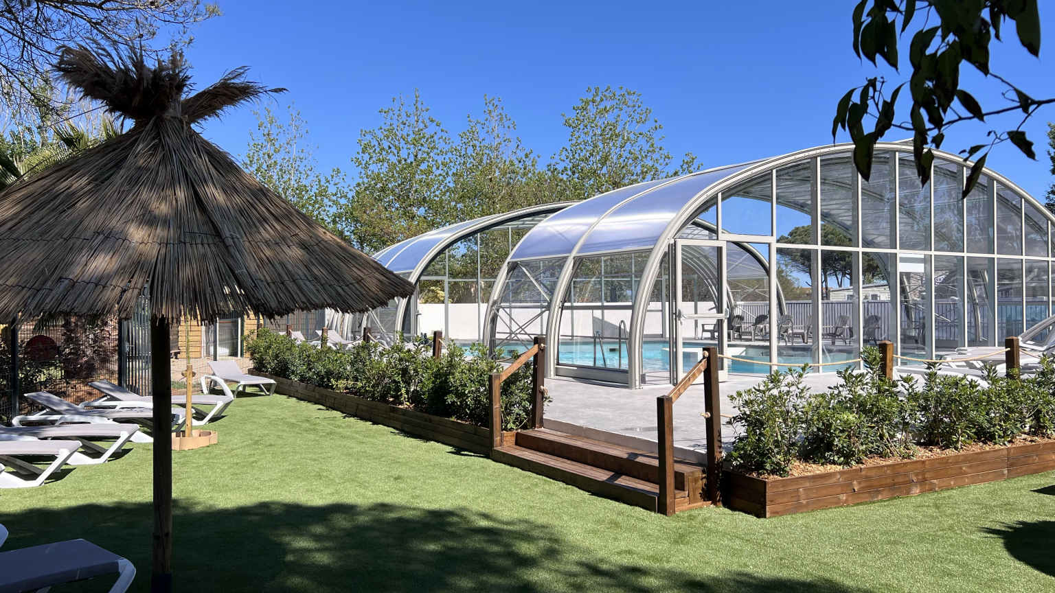 Long covered pool and sunloungers at le mediterranee plage, portiragnes-plage