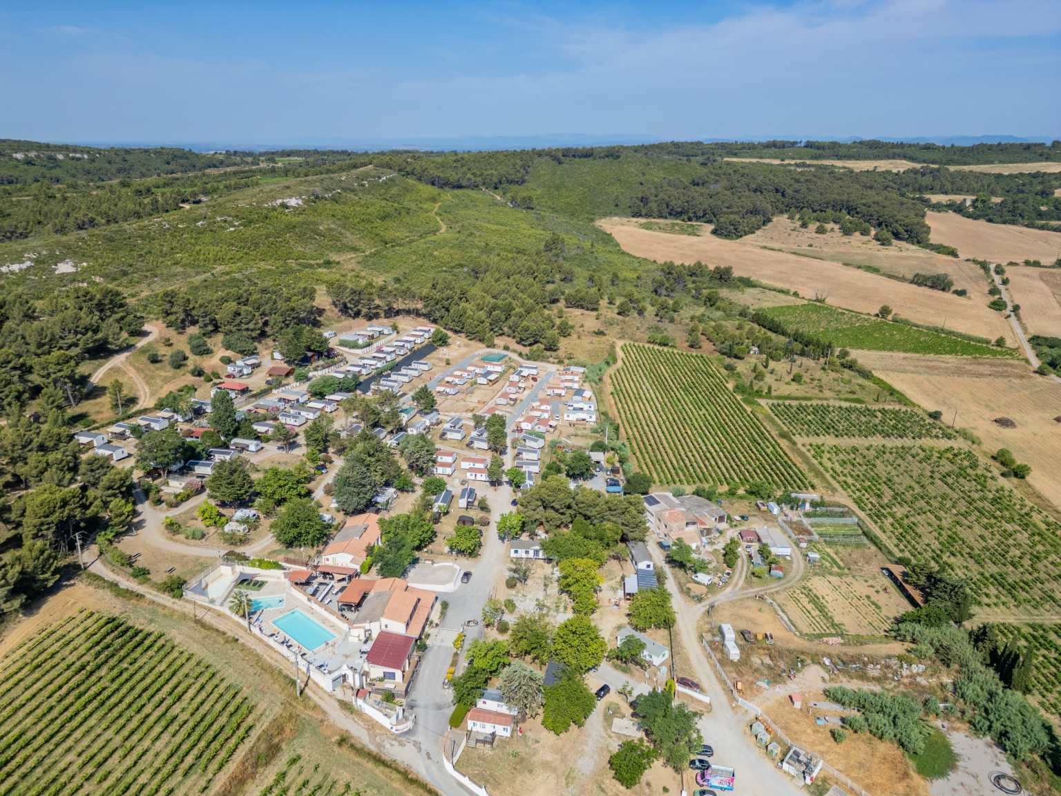 Wide aerial shot of the vineyards and fields around Borepo campsite in the Languedoc