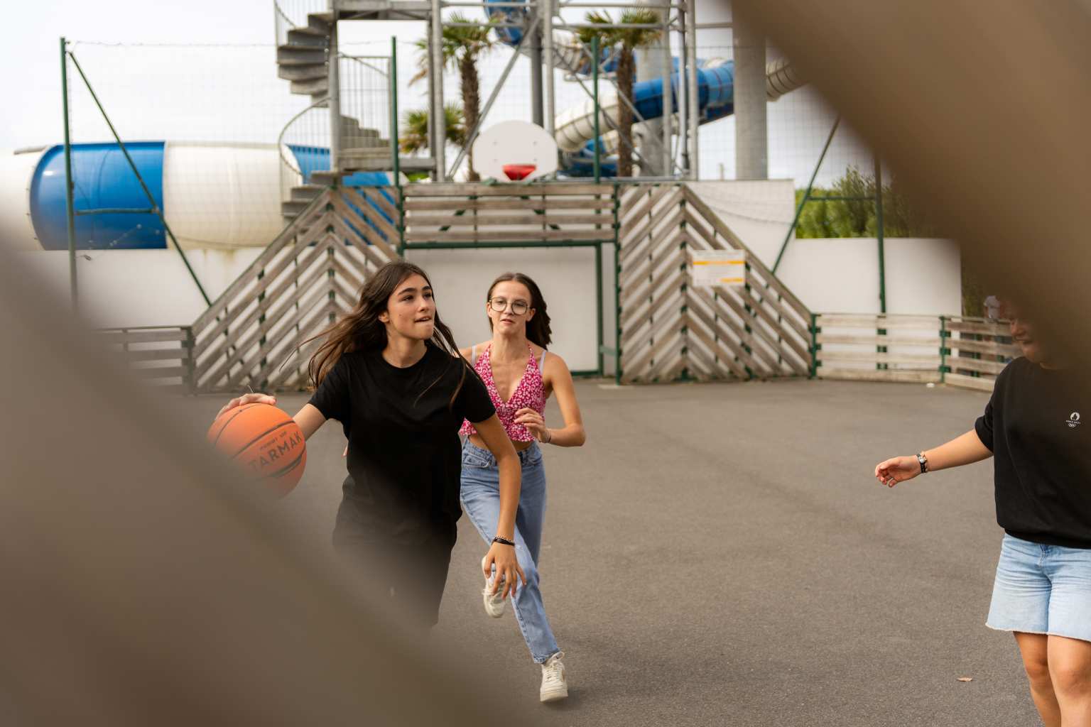 Children playing Basketball at Camping Les Places Dorées in the Vendée
