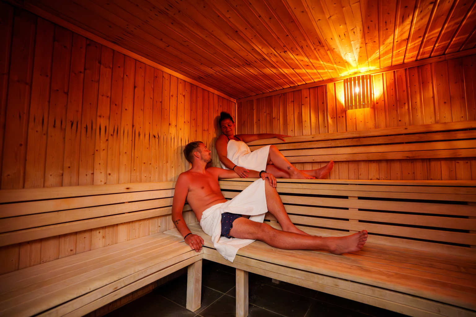 Two people in Sauna at Camping Les Places Dorées in the Vendée
