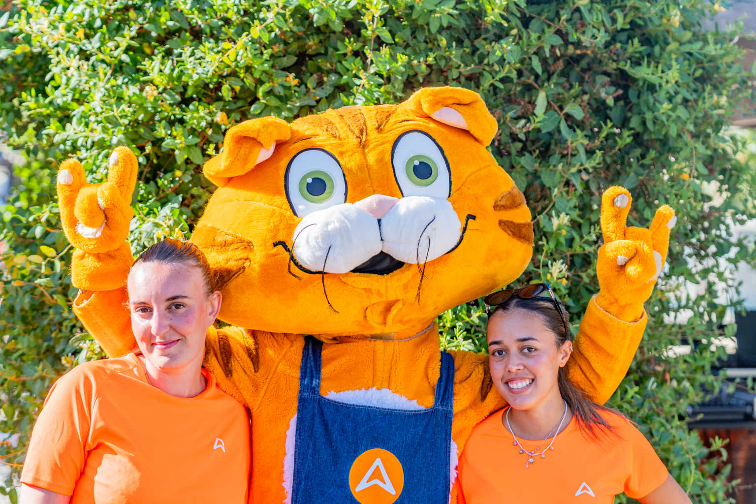 Two kids clubs couriers with mascot at Novela Port La Nouvelle campsite, Languedoc