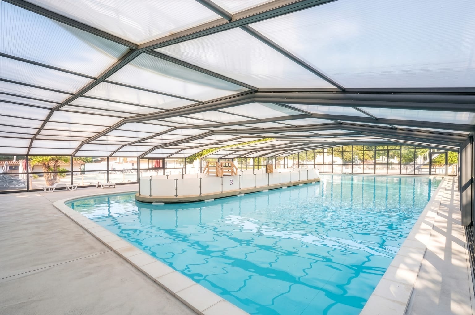 Covered pool and waterslides at Rivages des Landes, France