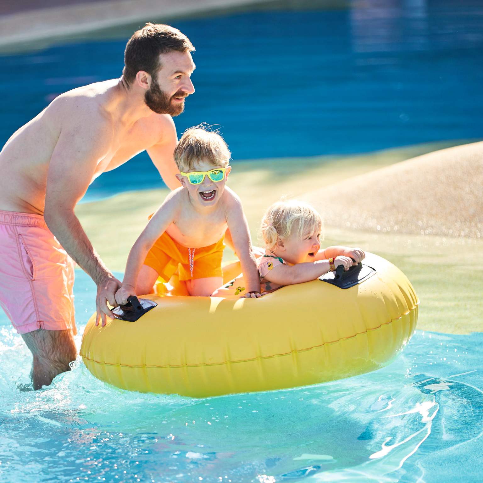 Toddler family, pool, inflatables
