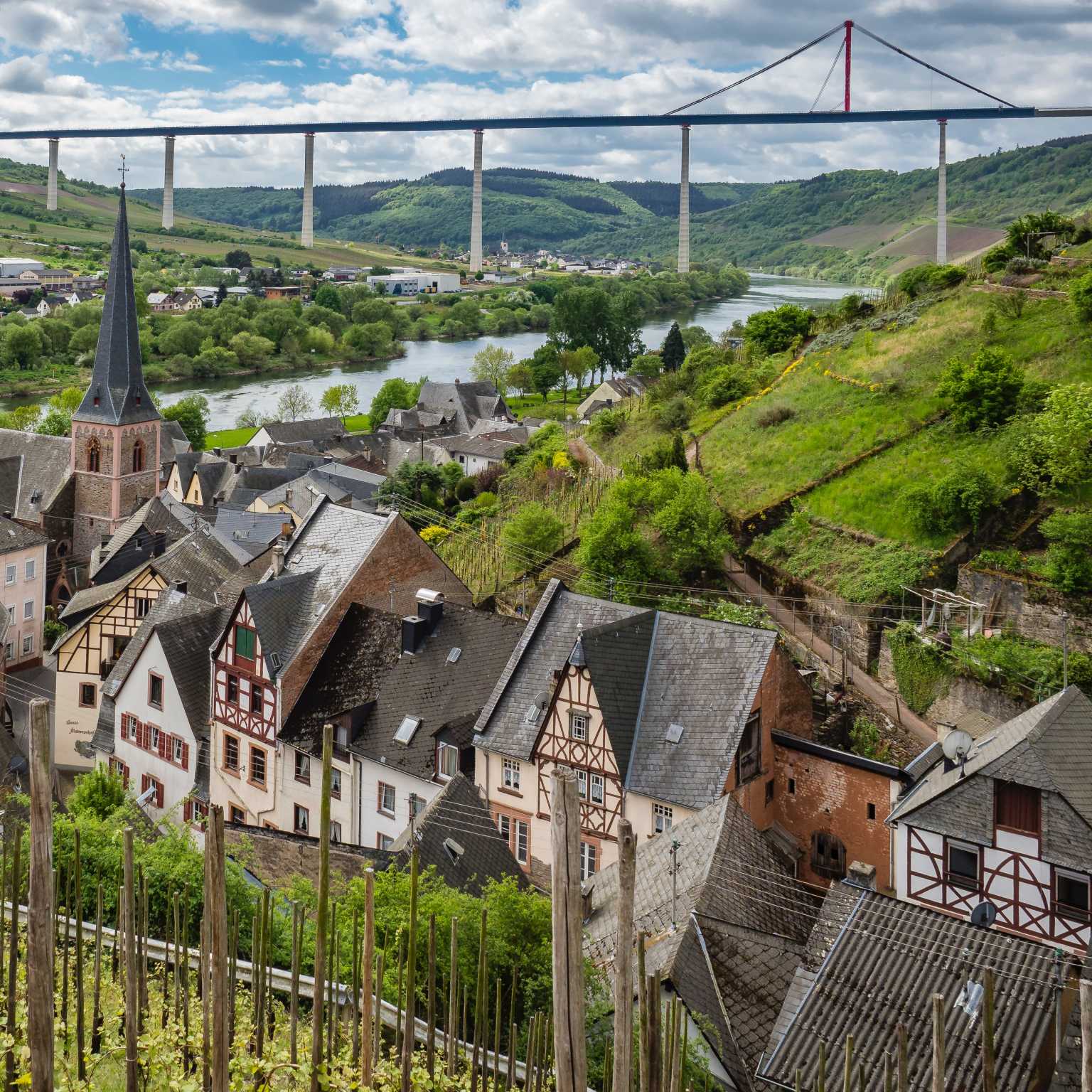 distant view of buildings and green hills in Rheinland Pfalz